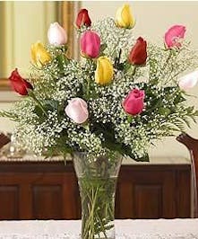 One dozen long stem roses in assorted colors. 