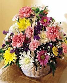 Basket of mixed multi colored flowers & filler 